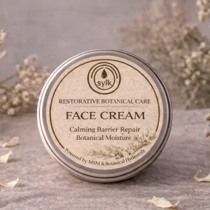 Tin of face cream by Sylk Skin.