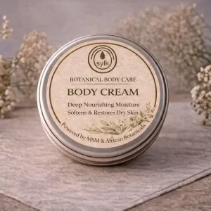 Tin of body cream by Sylk Skin.